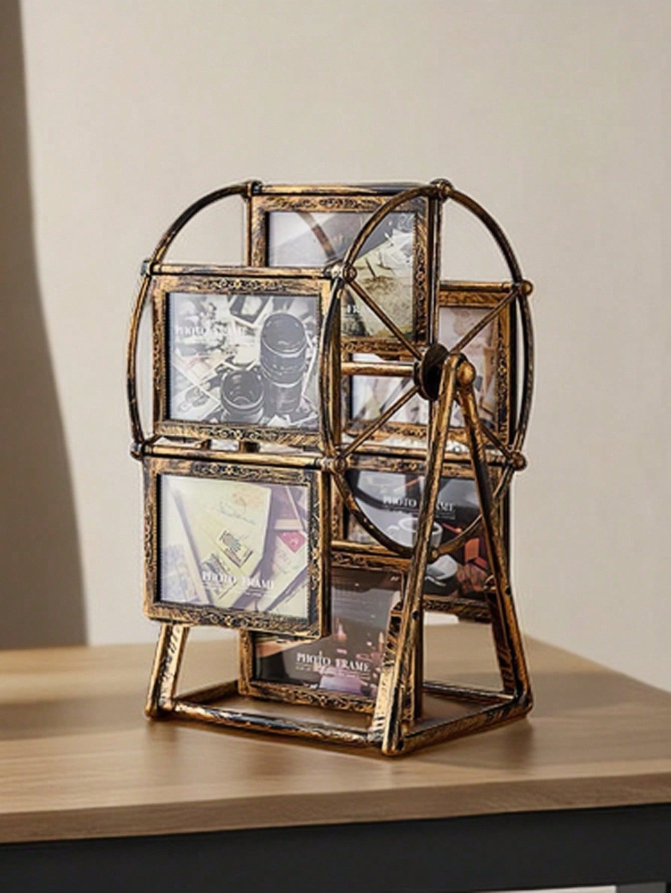 Add a touch of whimsy to your home decor with the Vintage Ferris Wheel 4-Inch Photo Frame. This charming desktop accent features a nostalgic ferris wheel design and holds a 4-inch photo for a personalized touch. Perfect for adding a fun and unique element to any living space.