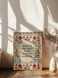 Vintage floral folk art poster with an optimistic quote displayed in a sunlit room