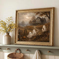 Vintage ghost cottage canvas print in a gold frame above an entry shelf