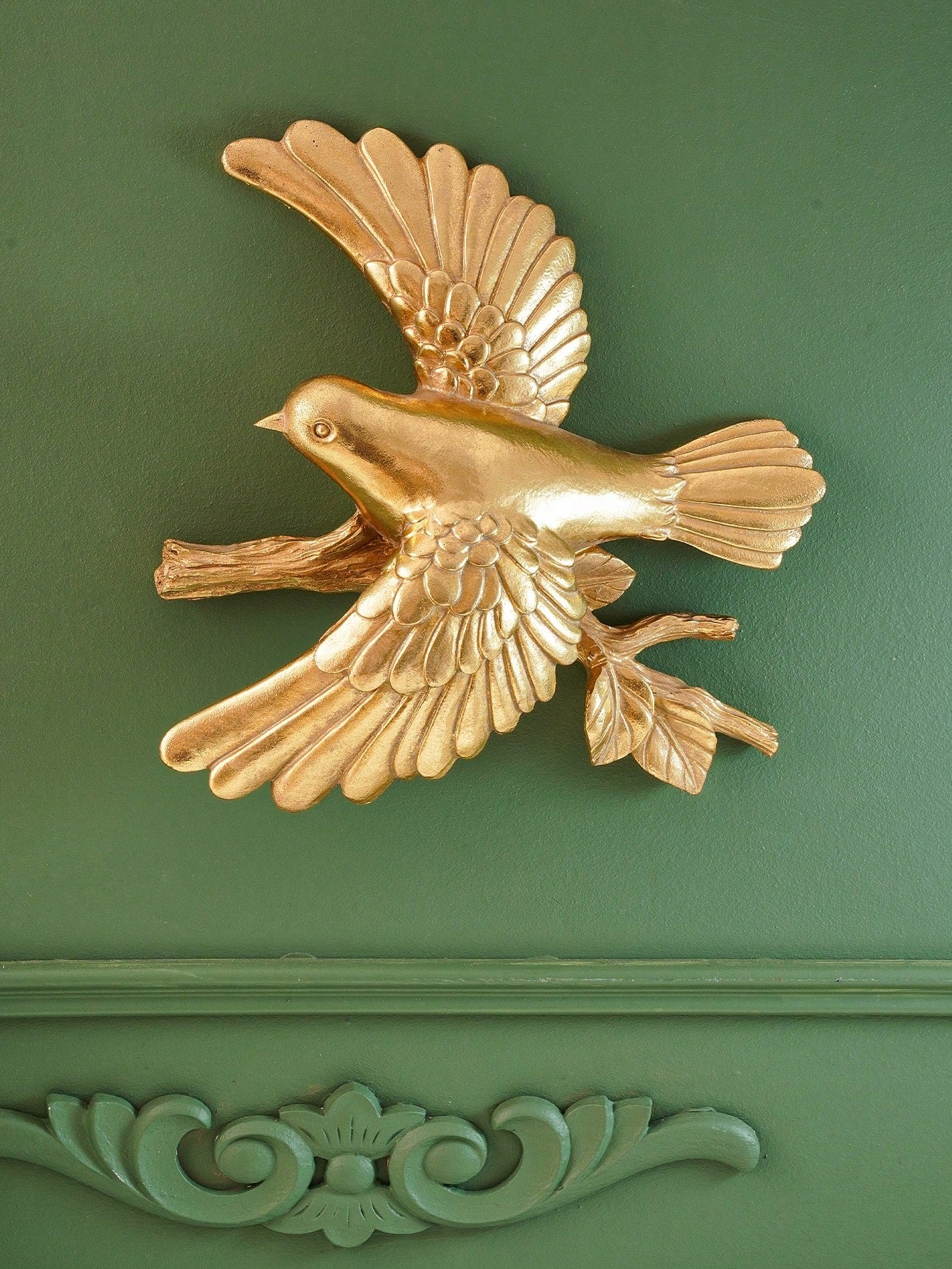 Elevate the style of any room with our Vintage Gold Resin Flying Bird Wall Decoration. Handcrafted with intricately detailed resin, this stunning piece adds a touch of elegance to your home decor. Perfect for any room, this unique and timeless piece is sure to impress.