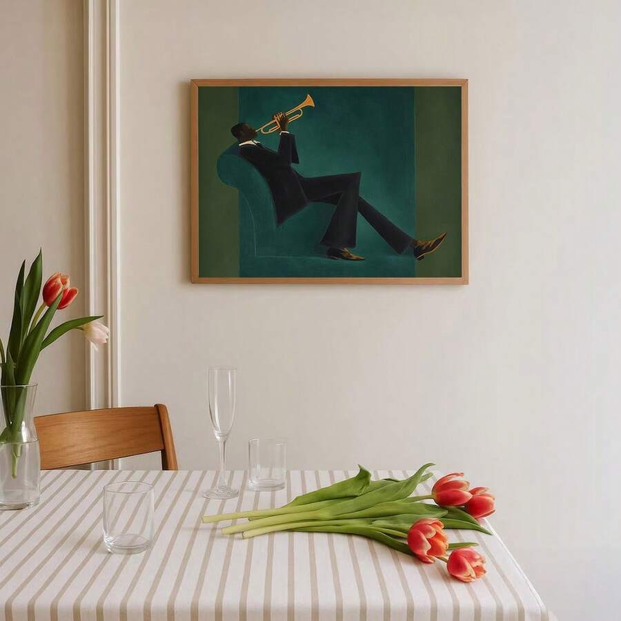 Framed green trumpet player canvas art above a dining table with red tulips