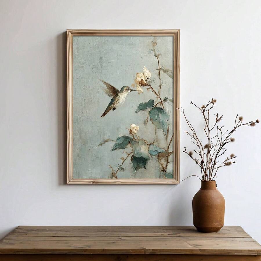 Vintage hummingbird botanical wall art with white flowers and pale blue background