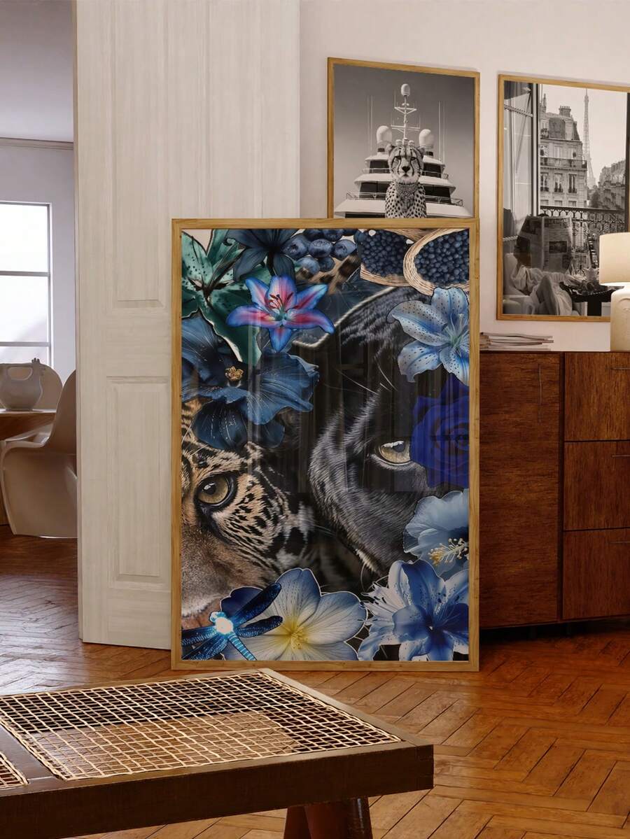 Framed leopard and black panther floral canvas print leaning beside a cabinet in an eclectic dining room