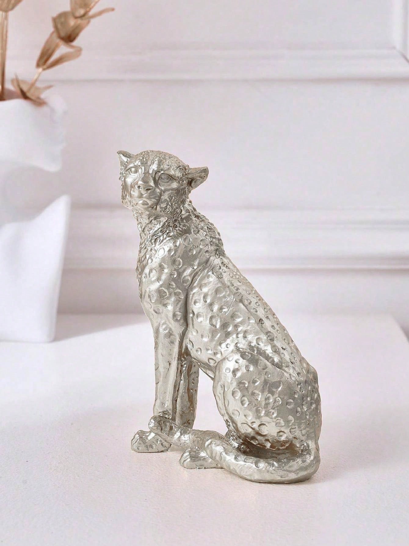 Add a touch of elegance to your office, study, foyer, or hotel with our Vintage Leopard Resin Desktop Ornament. Made of high-quality resin, this beautifully crafted ornament features a vintage leopard design that adds a unique touch to any space. Elevate your décor and impress your guests with this stunning piece.