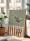 Framed cocktail martini painting leaning by bright window in modern living room