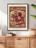 Vintage Oklahoma stamp canvas poster in a black frame above a wood cabinet