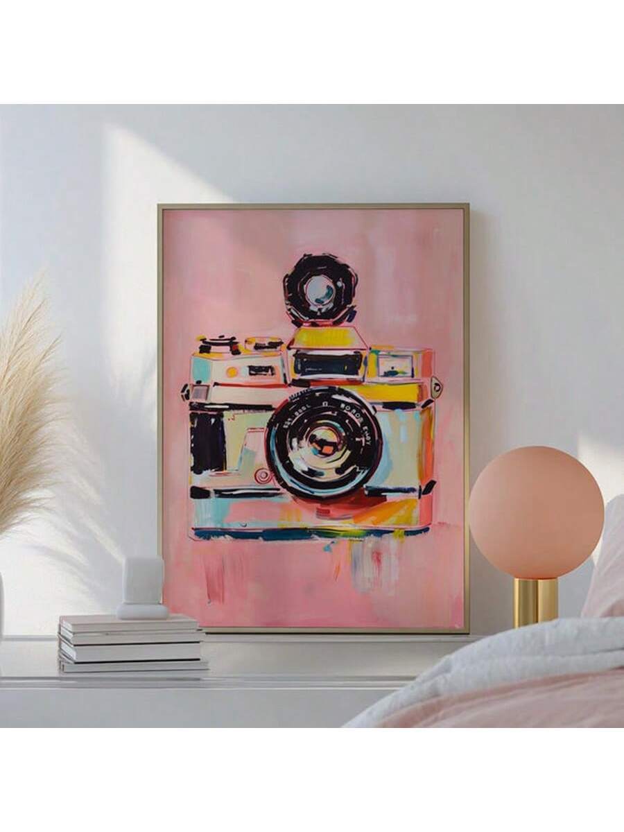 This vintage pink camera wall art is the perfect addition to any retro pastel bedroom or office decor. This Y2K girly canvas print will add a touch of nostalgia and style to your space. With its unique design and high-quality materials, it will surely be a conversation starter and make your space stand out.