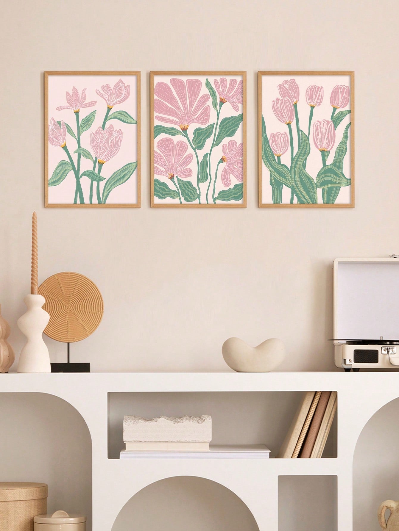 Add a touch of elegance to your living space with our Vintage Pink Tulip &amp; Rose Floral Art Prints. This set of 3 aesthetic wall decor pieces features intricate details and soft colors that will elevate any room. Bring the beauty of nature into your home with these vintage floral prints.