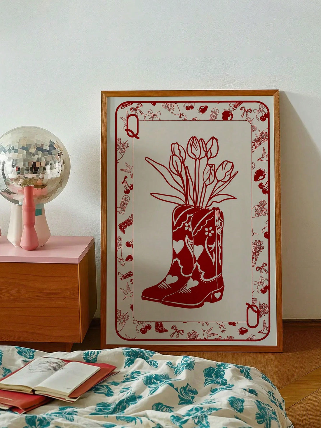 Celebrate timeless Western charm with this Vintage Queen of Hearts digital wall art. Featuring a retro cowgirl adorned with a cherry print and floral boots, this unframed piece adds a nostalgic yet stylish touch to any space. Perfect for enthusiasts of vintage decor, it brings character and warmth to your home or office with its unique blend of classic motifs and vibrant details. Easy to customize and print, it offers versatile decorating options for those who appreciate expert craftsmanship and distinctive