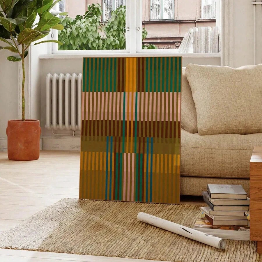 Green and mustard striped abstract poster beside a beige sofa