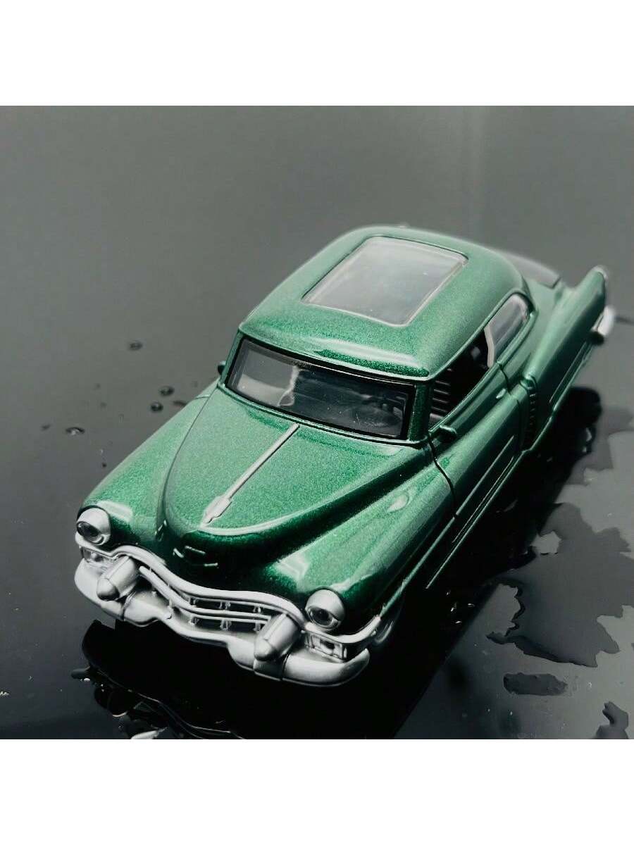 This vintage-style alloy car figurine is the perfect birthday cake topper. Crafted with intricate details and high-quality materials, it adds a touch of nostalgia to any celebration. Expertly designed for a unique and eye-catching addition to your cake. Enhance your special occasion with this charming cake topper.