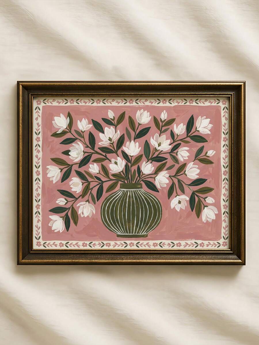 Framed magnolia floral canvas poster with white blossoms and green leaves in an olive vase
