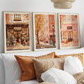 Autumn flower shop street and dessert store prints above bed