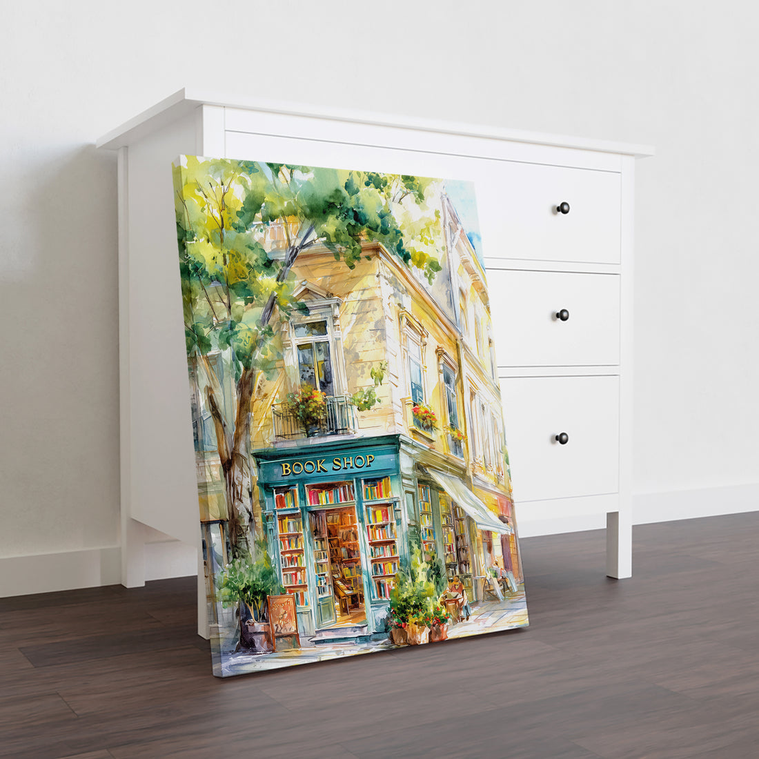 Transform your space with this evocative watercolor canvas art depicting a charming book shop nestled on a quiet street corner. Rendered in soft, flowing watercolor tones, the piece captures the romantic allure of literary spaces and urban architecture. The muted palette and artistic technique create a sophisticated focal point that complements contemporary and traditional interiors alike.