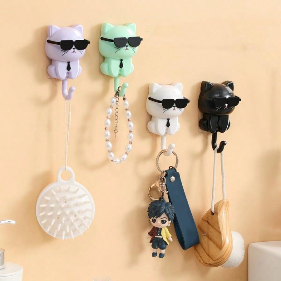 The Whimsical Cat Adhesive Hook is not only cute with its Macaron color, but also highly functional. With strong adhesion, it's perfect for hanging anything from keys to towels. Keep your space organized with this fun and practical hook.