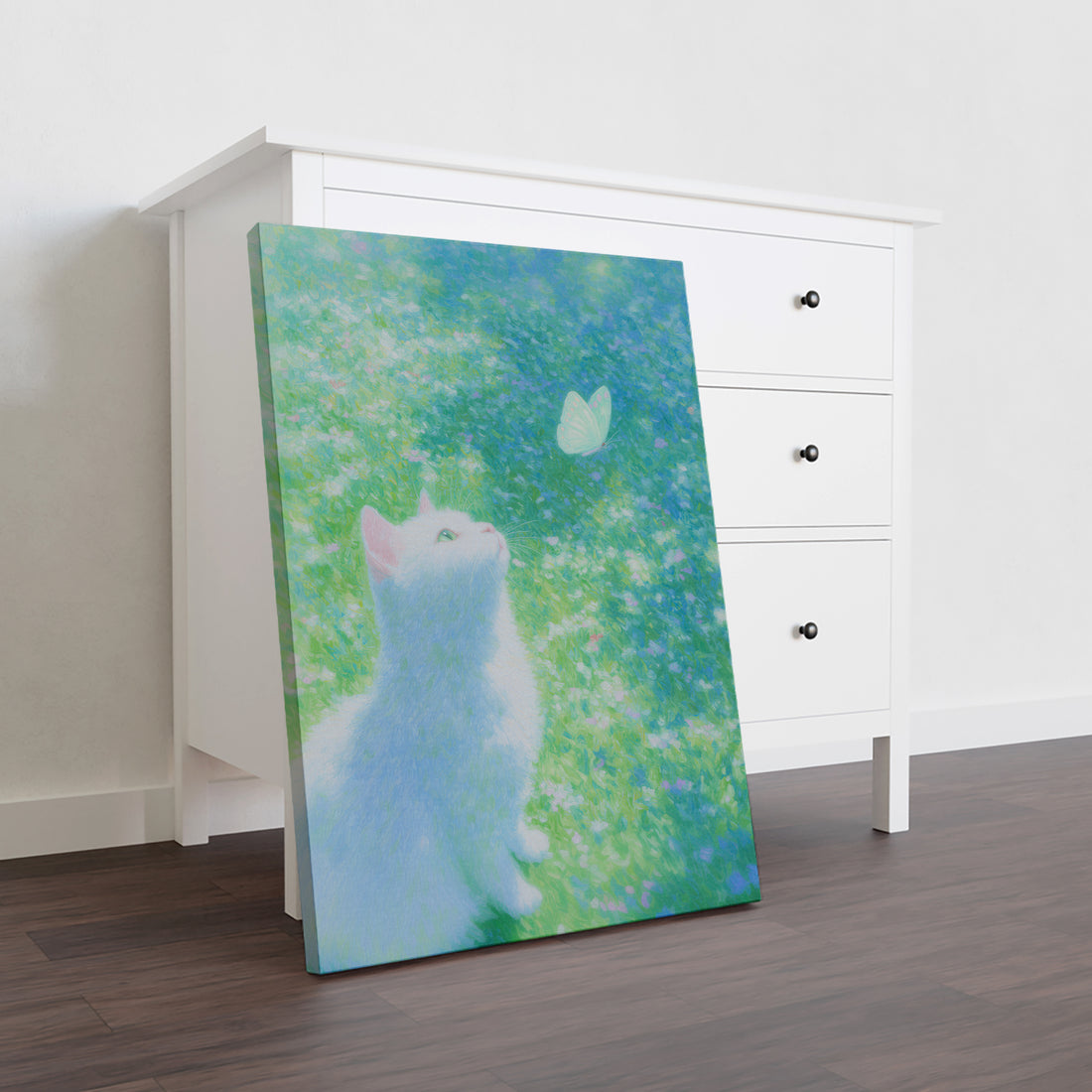 Bring enchanting garden charm into your home with this whimsical canvas wall art featuring a curious cat surrounded by delicate butterflies in a serene blue and green landscape. The soft, dreamy color palette creates a calming focal point perfect for living rooms, bedrooms, or above sofas.