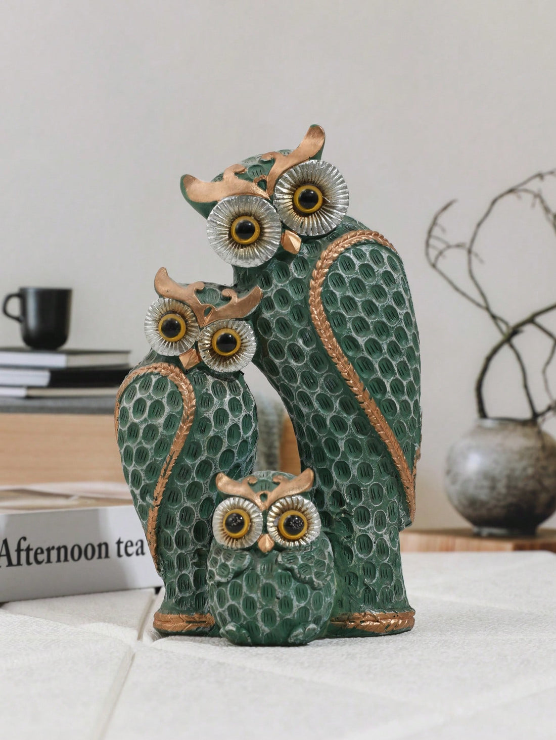Add a touch of whimsy to your home with our Whimsical Owl Family Home Decor Ornament. Featuring a playful design, this ornament will bring a sense of joy to any room. Expertly crafted with intricate details, this ornament is a charming addition to your decor. Made with high-quality materials for lasting durability.