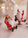 Elevate your holiday décor with this charming four-piece Santa Claus resin ornament set. Each whimsical figurine captures the festive spirit with intricate detailing and vibrant finishes, perfect for displaying on mantels, shelves, or Christmas trees. Crafted from durable resin, these collectible pieces blend traditional holiday aesthetics with contemporary design sensibilities. Ideal for creating a cohesive seasonal display or gifting to fellow holiday enthusiasts, this set brings warmth and character to a