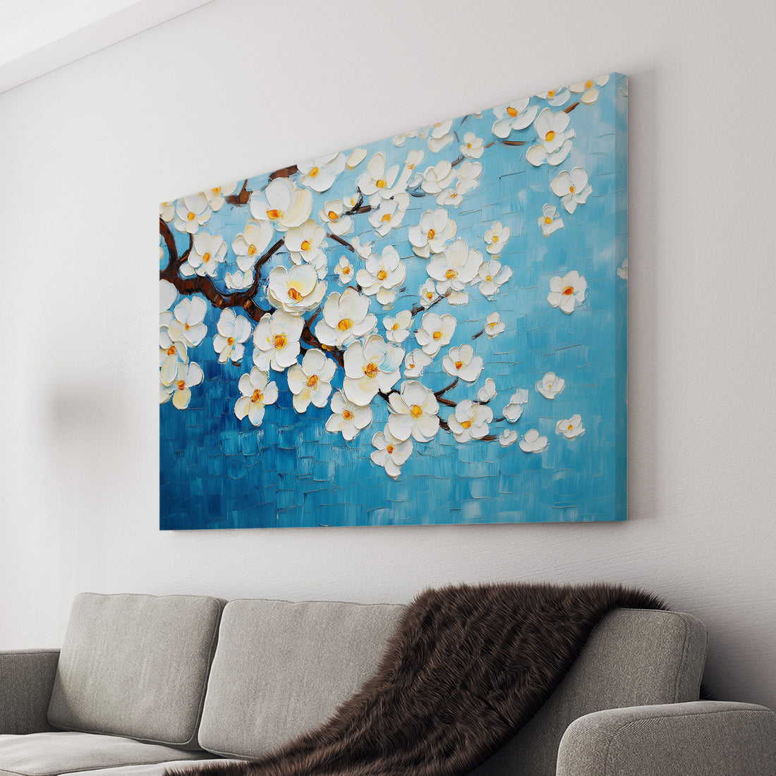 This White Cherry Blossom Canvas Wall Art features a stunning and intricate 3D textured floral painting on a calming blue background. Perfect for decorating your living room, sofa backdrop, or bedside, this piece will add a touch of elegance and beauty to your home decor.