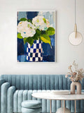 White hydrangea wall art with blue checkered vase