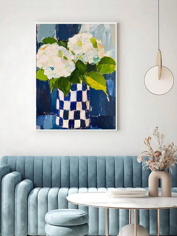 White hydrangea wall art with blue checkered vase