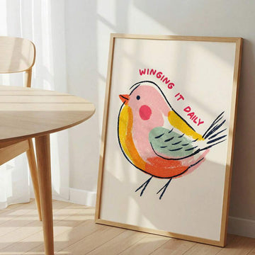 Funny pastel bird canvas poster framed beside a dining table