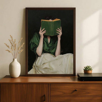 Woman reading book poster on wood dresser