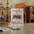 Framed Amore lettering canvas with blush brush script and dark center word