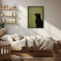Framed black cat wall art with olive-green textured background